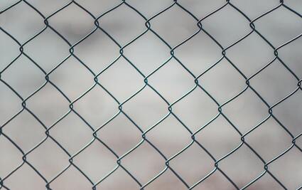 Picture of a gray chain link fence in Puyallup, Washington